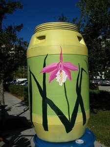 Iris painted on a rain barrel.