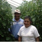 Rubiera and her husband in their greenhouse.