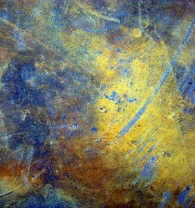 Abstract painting in blue and gold.