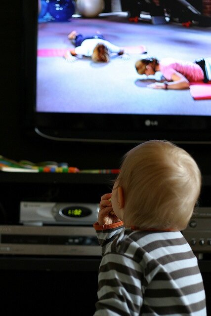 Baby or toddler watching television.